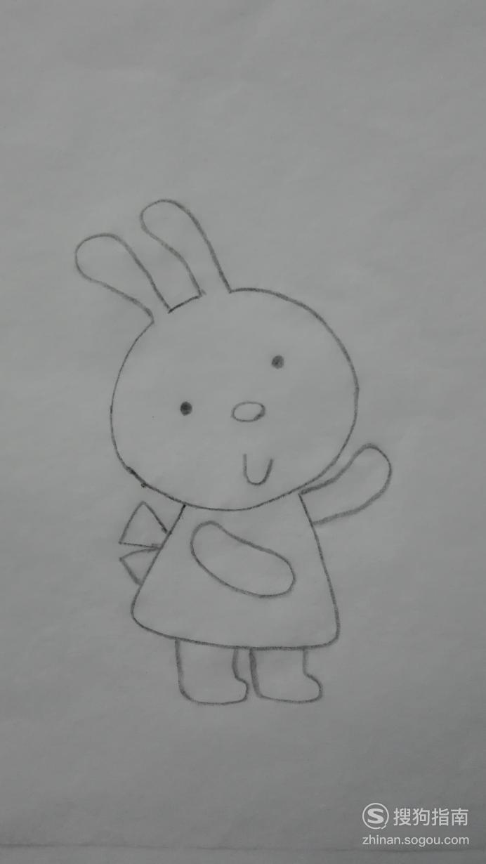 如图所示:04用曲线画出小兔的衣服的轮廓,用封闭的曲线画出小兔的胳膊